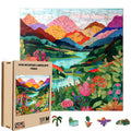 The Mountain Abstract Wooden Jigsaw Puzzle by lycheepuzzles, featuring 200 pieces, offers a captivating scene of a vibrant mountain landscape adorned with colorful flowers and a serene lake. Accompanied by its box and several animal-shaped puzzle pieces, this stress-relief puzzle includes uniquely shaped components that make it as enjoyable to assemble as it is to showcase.