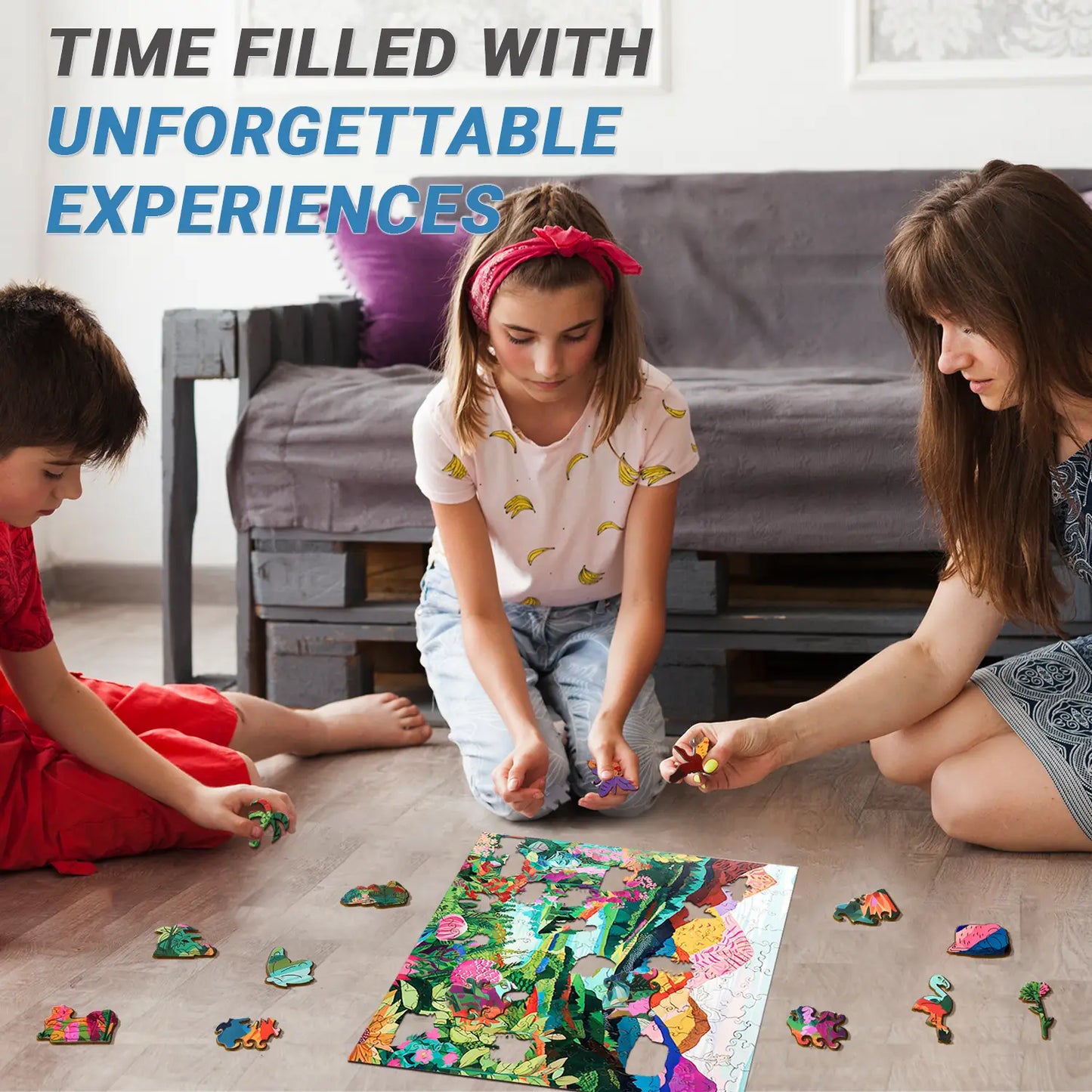 In a living room, two children and a woman sit on the floor putting together the Mountain Abstract Wooden Jigsaw Puzzle by lycheepuzzles. The colorful 200-piece puzzle features unique shapes that promise time filled with unforgettable experiences.